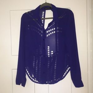 Blue blouse with cutouts and open back